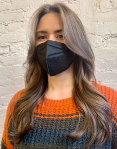 90s vibes center part layered bangs with a subtle balayage